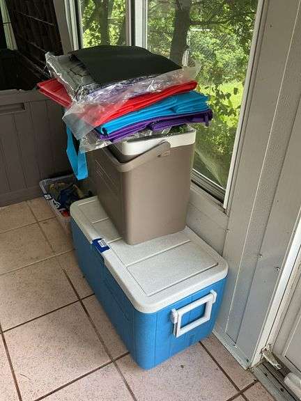 Two Coleman coolers and tote bags