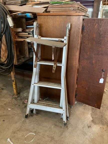 Multi-position folding ladder