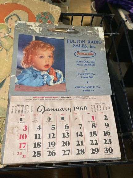 Paper ephemera including: postcards, child's Christmas book, 1960 advertising calendar