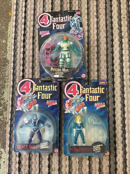 Three Fantastic Four action figures in packages