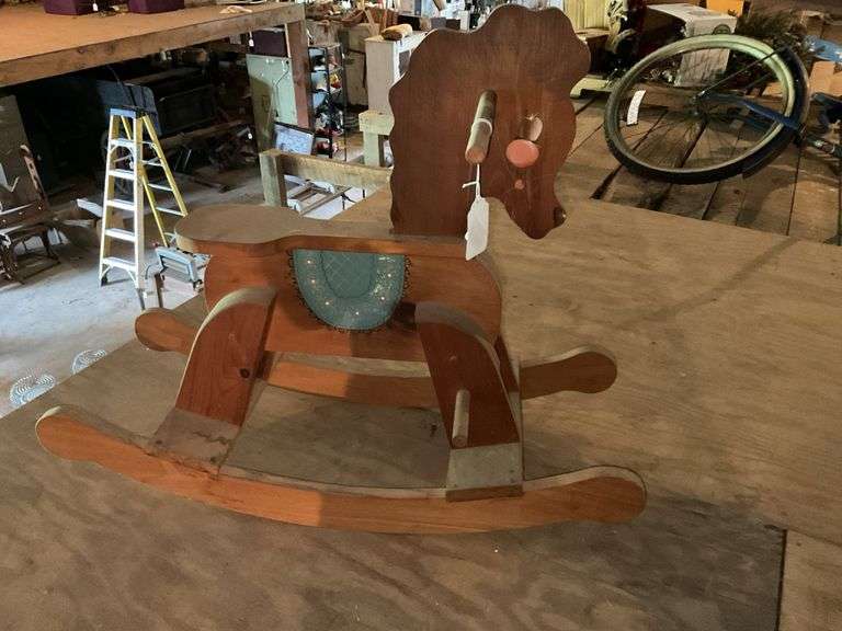 Handcrafted wooden rocking horse, *** PLEASE NOTE: This item has no stair access and must be picked up on July 15th between 11:00-1:30PM. Item will be removed from loft for pickup.