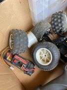 Vintage Gas Traxxs RC car with controller and extra parts