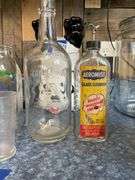 Eastman-Kodak graduated measure and vintage bottles