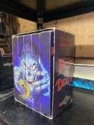Contents of shelf: Faces of Death VHS box set, music CDs in case