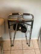 Contents of bath/laundry room: Bath stool, towels, heath & body products, walker, under sink contents, wall plaque, misc. Washer and Dryer NOT FOR SALE.