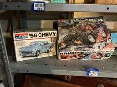 Contents of shelf: vintage car/truck model kits in boxes