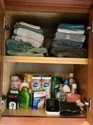 Contents of bath/laundry room: Bath stool, towels, heath & body products, walker, under sink contents, wall plaque, misc. Washer and Dryer NOT FOR SALE.
