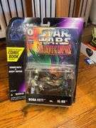 Star Wars collectibles including: VHS tapes, figures, CommTech reader, Darth Vader watch