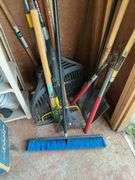 Corner lot: push broom, pick, rakes, lopper, shovel