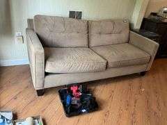 Tan upholstered sofa 78in long