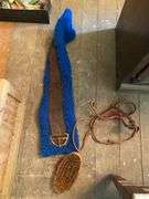 Horse tack in wooden crate