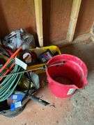 Coal bucket, plastic buckets, extension cord, bar clamp, paint roller, misc