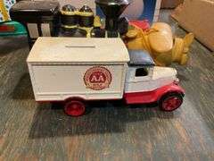 Figural banks including: trucks, locomotive, car, pig