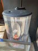 Aquarium on stand and two other aquariums, and accessories