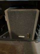 Contents of shelf: Wildfire WF1200 generator, vintage slide projector