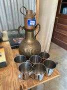 Copper jug, handled brass vase, metal cups set
