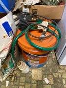 Yard blower in box, plastic kerosene can, antifreeze, motor oil, work gloves, misc