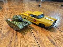 Toy lot including: litho tin Yellow Cab and tank, pressed steel truck, train signal, wooden trucks