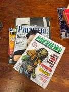 Scrapbook, magazines, paper collectibles, Lions Club cap, bracket wall shelf