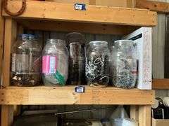 Contents of shelf: jars of hardware, ball ties, misc