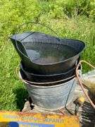 Wooden nesting box and contents: jump started, extension cords, coal bucket, buckets, replacement window, tools, misc