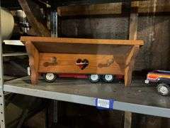 Wooden bracket shelves, metal horse cutouts