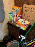 Contents of closet: MooSoo vacuum, Hoover upright vacuum, hand vac, cleaning supplies, Swiffer and refills, drawer unit, metal shelf unit, hangers, misc