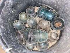 Glass insulators in speckled enamel kettle