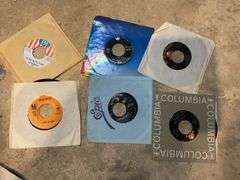 Vintage 45rpm records including: Brenda Lee, Johnny Rivers