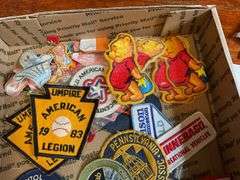 Patches including: Navy Seaman Apprentice, advertising, school letters