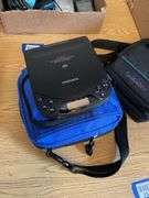 Memorex personal AM/FM/Cassette player in package and 2 portable cd players
