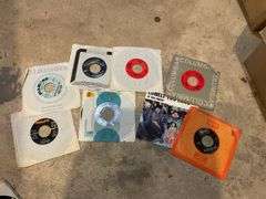 Vintage 45rpm records including: Brenda Lee, Johnny Rivers