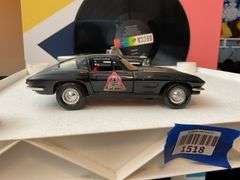 Two model cars: Dale Earnhardt 55 Chevy and Big A Auto Parts 30 year 1963 Corvette