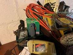 Black & Decker drill, drill bits, trouble light, scrub brush, basket, misc