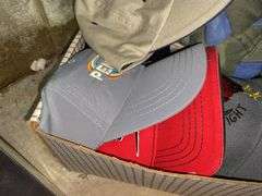 Box of baseball caps
