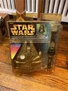 Star Wars collectibles including: VHS tapes, figures, CommTech reader, Darth Vader watch