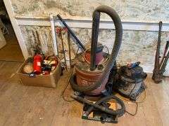 Two Craftsman shop vacs, fire extinguishers, package tape handle