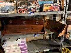 Wooden bracket shelves, metal horse cutouts