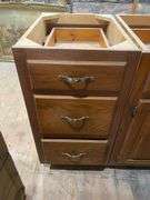 Two oak base cabinets 27x24x35 and 18x24x35