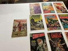 Comic books including: Lois Lane, Captain Storm, Army, Batman