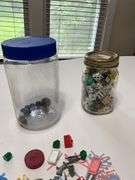 Jars of marbles, dice, and trinkets
