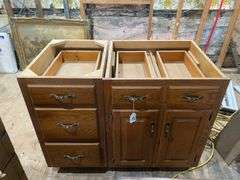 Two oak base cabinets 27x24x35 and 18x24x35