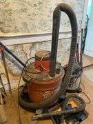 Two Craftsman shop vacs, fire extinguishers, package tape handle
