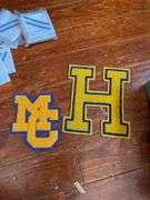 Patches including: Navy Seaman Apprentice, advertising, school letters