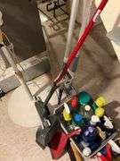 Lasso pedestal fan, cleaning supplies, mop, hand broom, dust pans