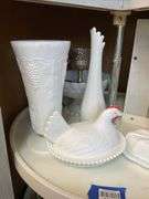 Contents of shelf: milk glass hen on nest, swung vase, compote, butter dish, grape vase, lamp base