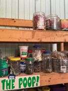 Contents of two shelves: hardware, trouble light