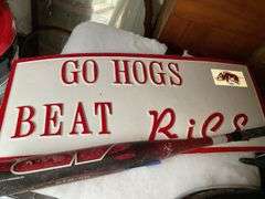 Pro-Tec skate helmet, GO HOGS sign, Louisville Slugger TPX baseball bat