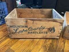Two wooden advertising fruit crates