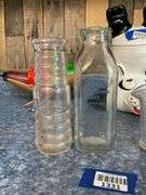 Eastman-Kodak graduated measure and vintage bottles